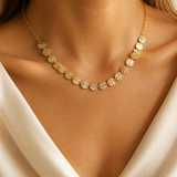 Model wearing Elara Medallion Necklace in gold [finish:gold]