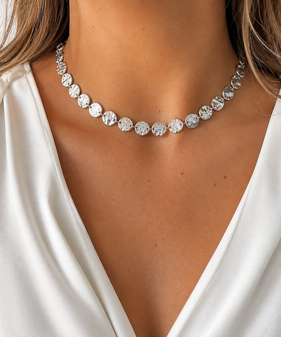 Model wearing Elara Medallion Necklace in silver [finish:silver]