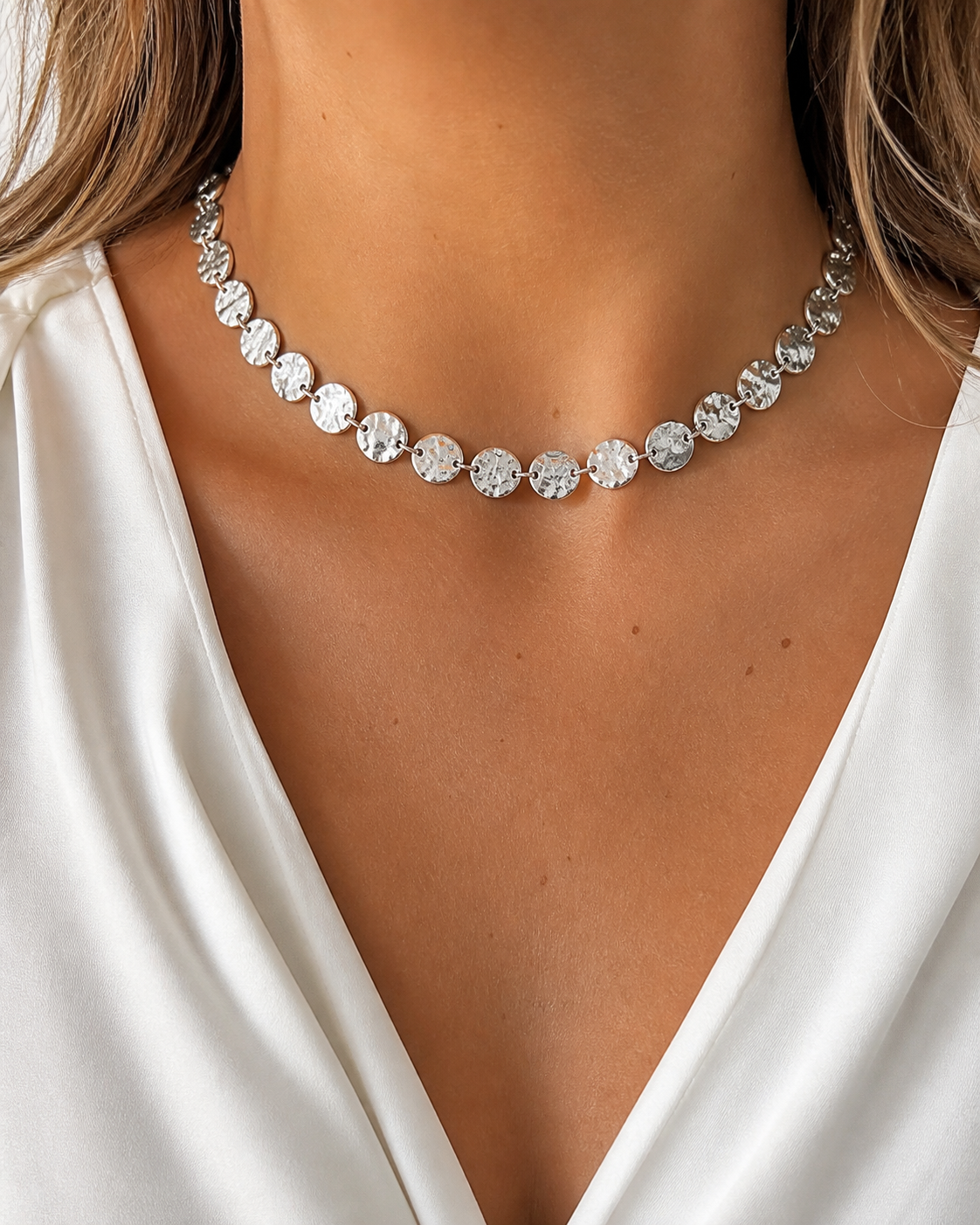 Model wearing Elara Medallion Necklace in silver