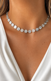 Model wearing Elara Medallion Necklace in silver [finish:silver]