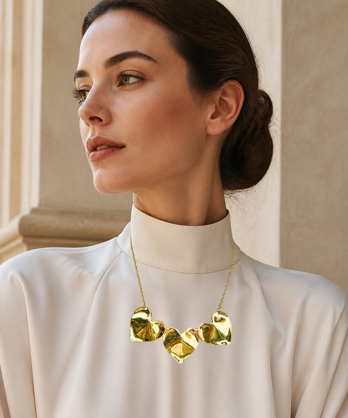 Model wearing Fiora Petal Necklace in gold [finish:gold]
