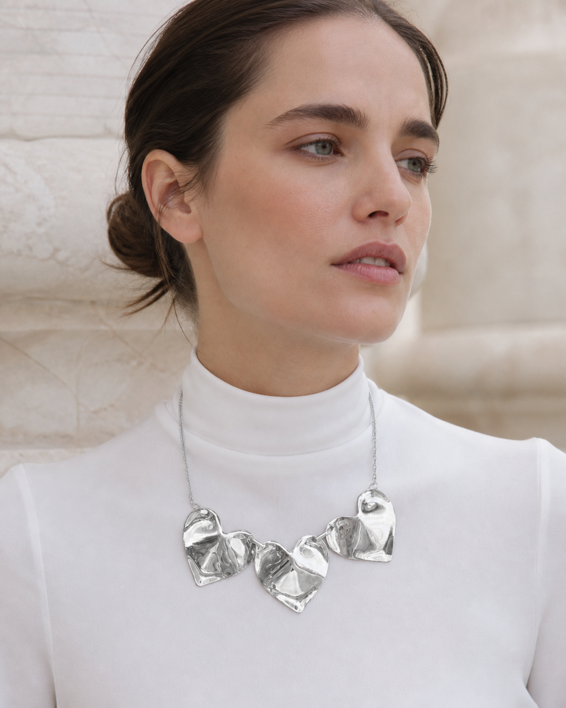 Model wearing Fiora Petal Necklace in silver