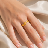 Model wearing Elowen Gold-Plated Steel Ring