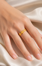 Model wearing Elowen Gold-Plated Steel Ring