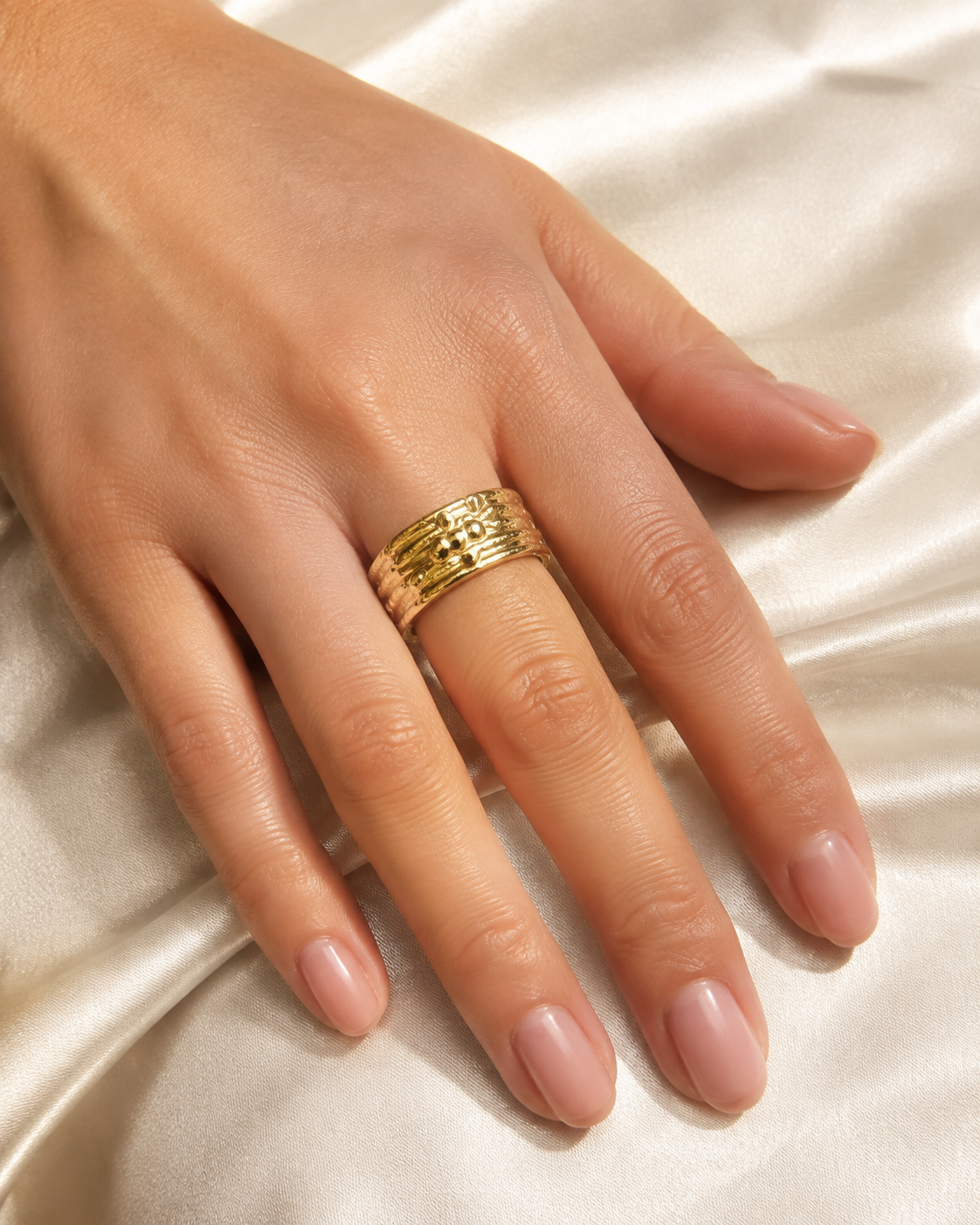 Model wearing Selah Gold-Plated Steel Ring