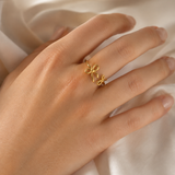 Model wearing Thalassa Gold-Plated Steel Ring