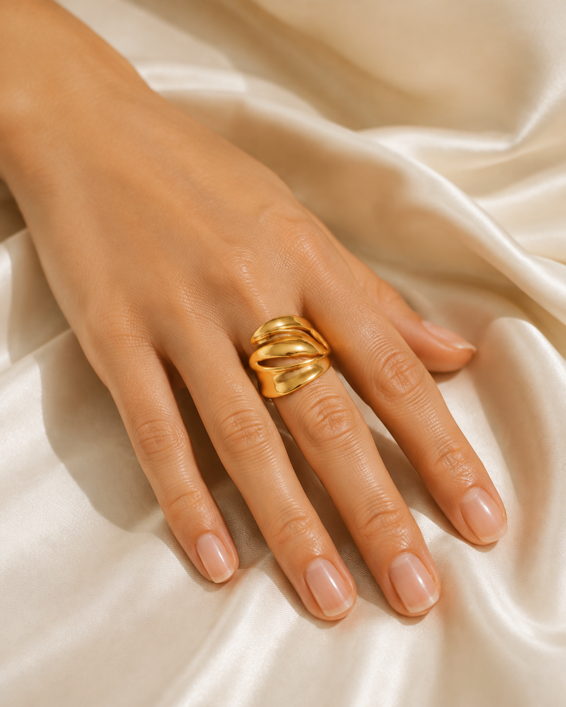 Model wearing Briony Gold-Plated Steel Ring