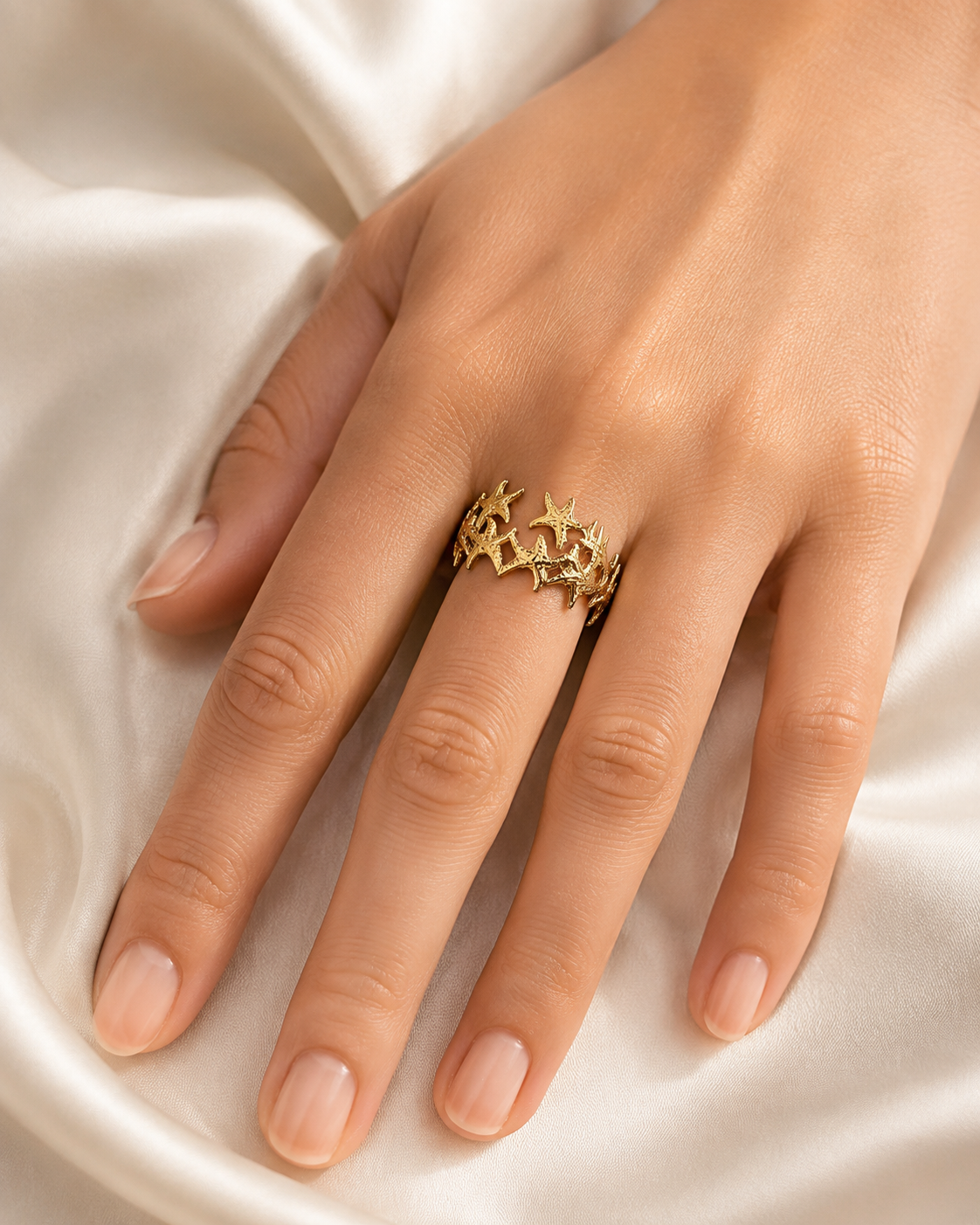 Model wearing Calla Gold-Plated Steel Ring