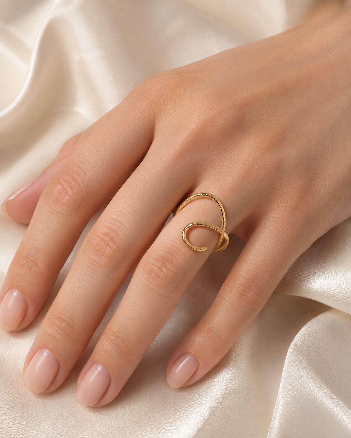 Model wearing Delphine Gold-Plated Steel Ring