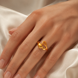 Model wearing Ianthe Gold-Plated Steel Ring