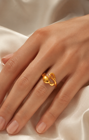 Model wearing Ianthe Gold-Plated Steel Ring