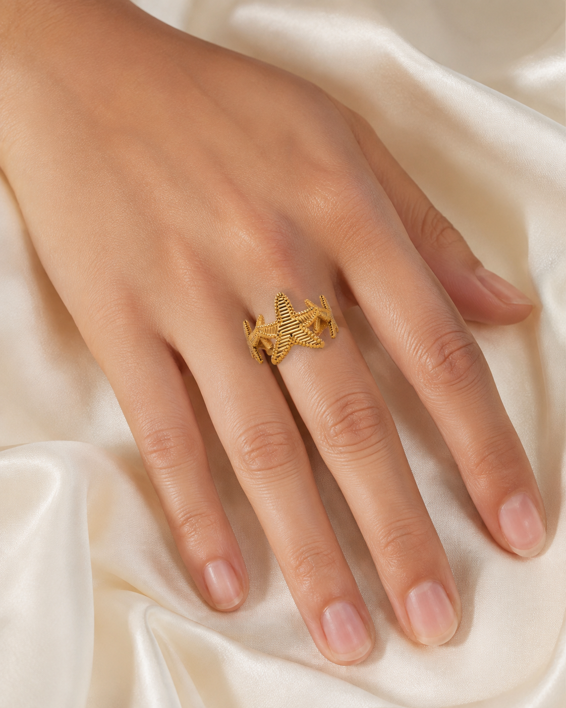 Model wearing Marisela Gold-Plated Steel Ring
