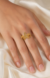 Model wearing Marisela Gold-Plated Steel Ring