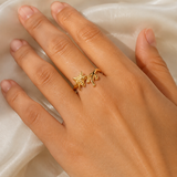 Model wearing Aveline Gold-Plated Steel Ring