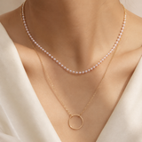 Model wearing Liora Pearl Heart Necklace — Edition 1
