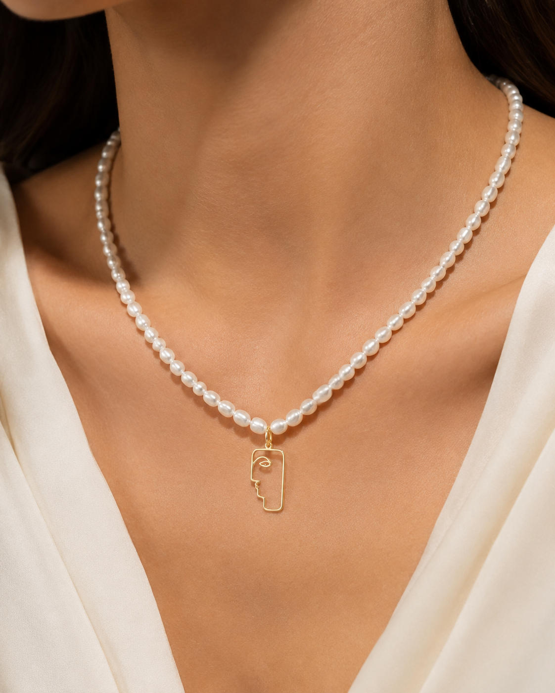 Model wearing Liora Pearl Heart Necklace — No. 2