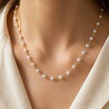 Model wearing Liora Pearl Heart Necklace — No. 3