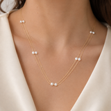 Model wearing Liora Pearl Heart Necklace — No. 4