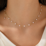 Model wearing Liora Pearl Heart Necklace — No. 60