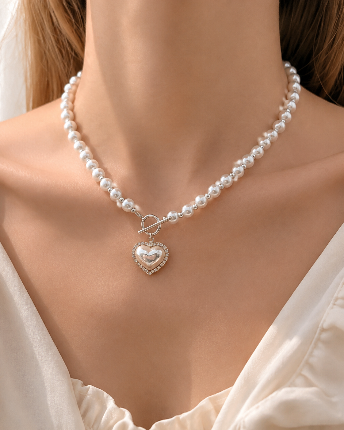 Model wearing Liora Pearl Heart Necklace — Edition 4