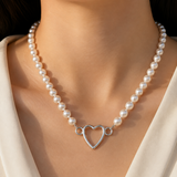 Model wearing Liora Pearl Heart Necklace — Edition 5