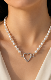 Model wearing Liora Pearl Heart Necklace — Edition 5
