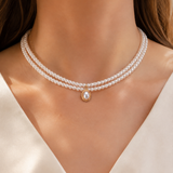 Model wearing Liora Pearl Heart Necklace — Edition 6
