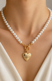Model wearing Liora Pearl Heart Necklace — Edition 8