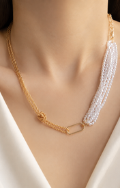 Model wearing Liora Pearl Heart Necklace — Edition 10