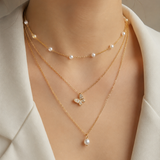 Model wearing Liora Pearl Heart Necklace — No. 28