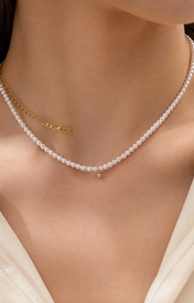 Model wearing Liora Pearl Heart Necklace — Edition 11
