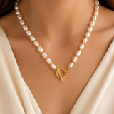 Model wearing Liora Pearl Heart Necklace — Edition 13