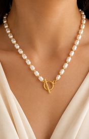 Model wearing Liora Pearl Heart Necklace — Edition 13