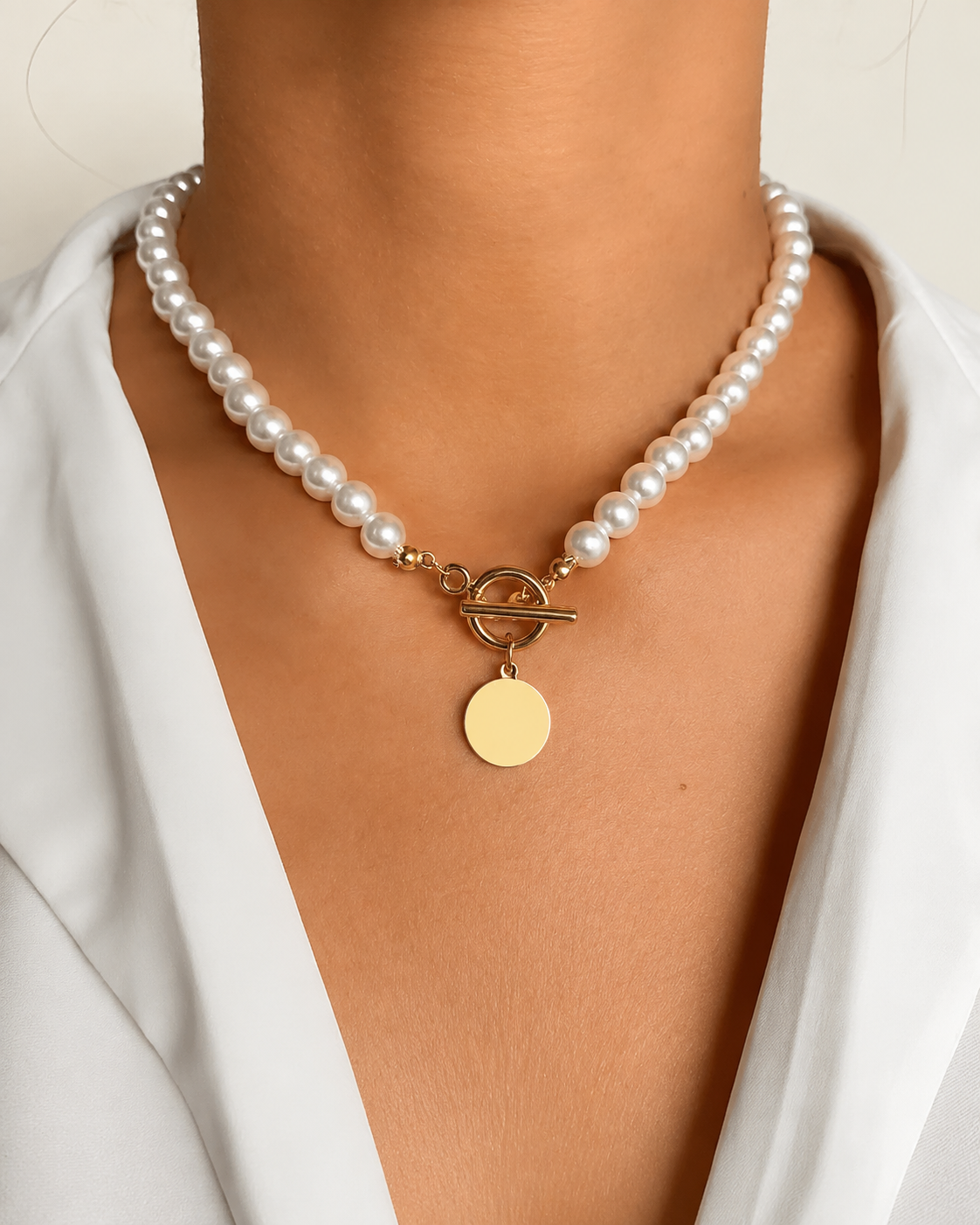 Model wearing Liora Pearl Heart Necklace — Edition 14