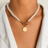 Model wearing Liora Pearl Heart Necklace — Edition 14