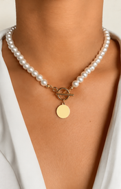 Model wearing Liora Pearl Heart Necklace — Edition 14