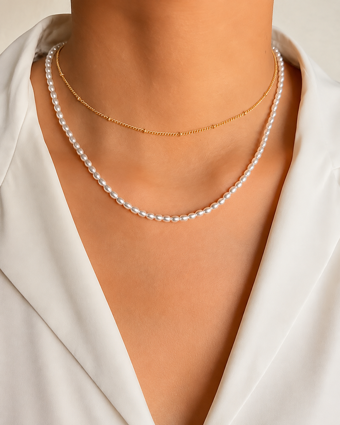 Model wearing Liora Pearl Heart Necklace — Edition 15