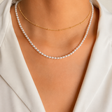 Model wearing Liora Pearl Heart Necklace — Edition 15