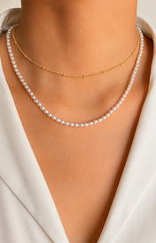 Model wearing Liora Pearl Heart Necklace — Edition 15