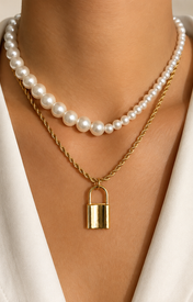 Model wearing Liora Pearl Heart Necklace — Edition 16