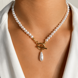 Model wearing Liora Pearl Heart Necklace — Edition 17