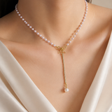 Model wearing Liora Pearl Heart Necklace — Edition 21