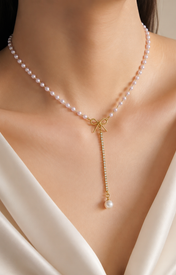 Model wearing Liora Pearl Heart Necklace — Edition 21