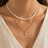 Model wearing Liora Pearl Heart Necklace