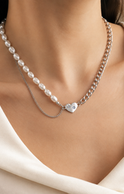 Model wearing Selene Pearl Heart Necklace