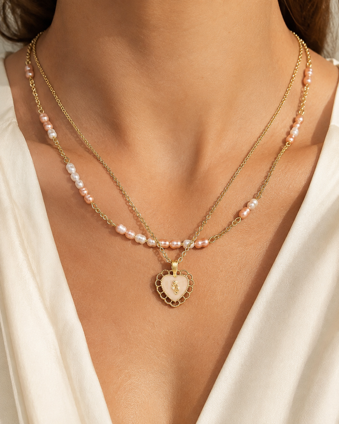 Model wearing Amara Pearl Heart Necklace