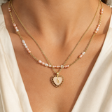 Model wearing Amara Pearl Heart Necklace